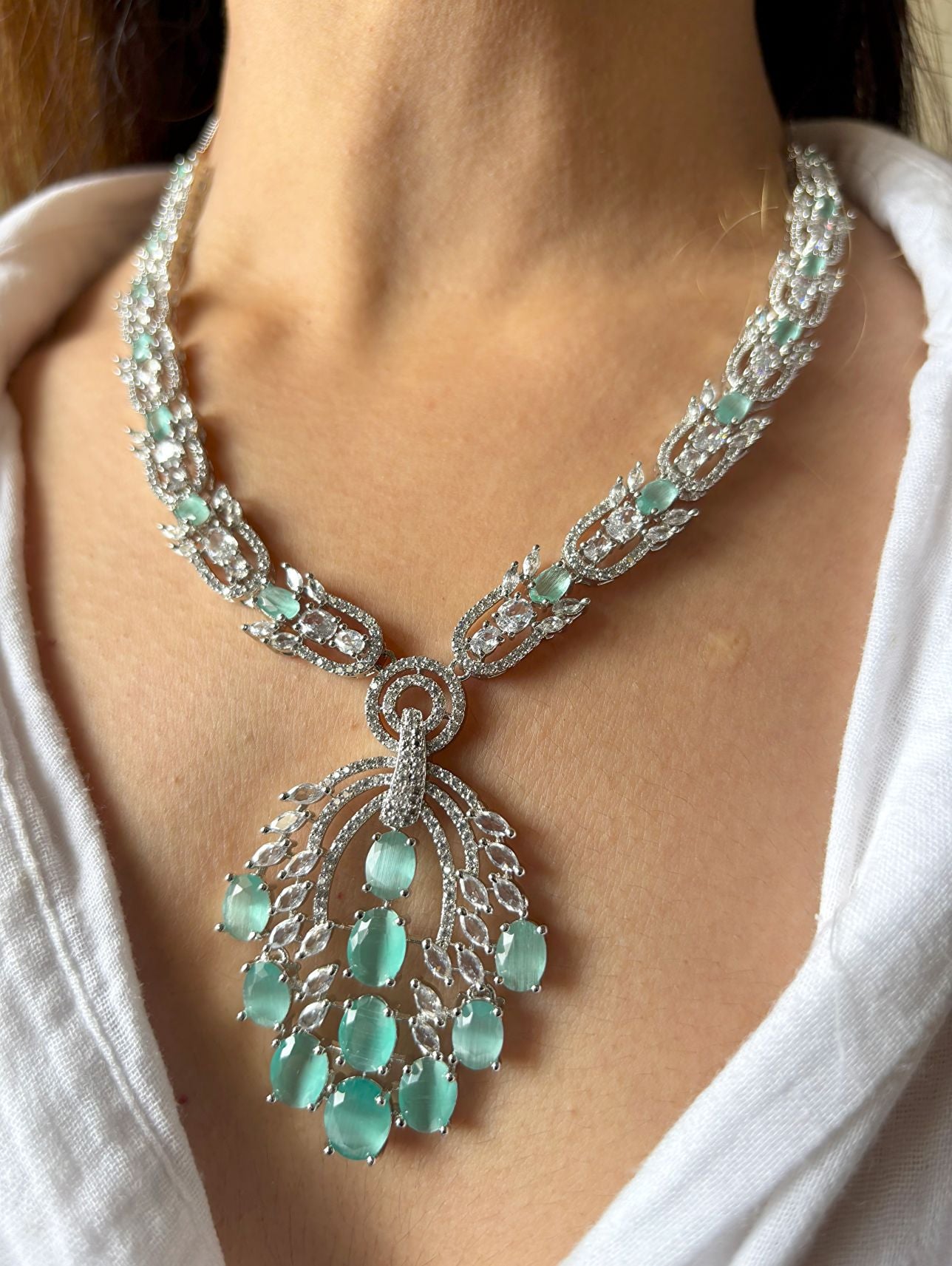 Shop NL25A032 Royal Mint Green Doublet Stone Heavy Necklace In AD online in India. Explore elegant bridal AD jewellery online. Shop premium bridal jewellery sets in Zircon, AD, Kundan, Victorian Diamond. Collection best suited for Indian weddings, parties and special occasions. Choose AD Necklace in pink stone for sarees, lehengas and gowns. -upper