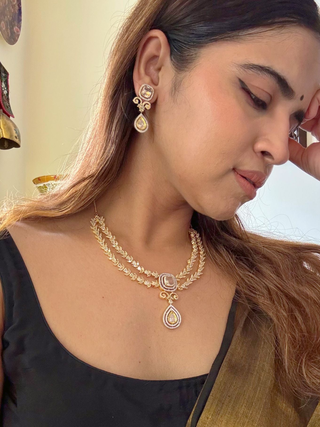 Shop Beautiful Gold Polish Set In AD For Sarees online in India. Explore elegant bridal AD jewellery online. Shop premium bridal jewellery sets in Zircon, AD, Kundan, Victorian Diamond. Collection best suited for Indian weddings, parties and special occasions. Choose AD Necklace in gold polish for sarees, lehengas and gowns. -third