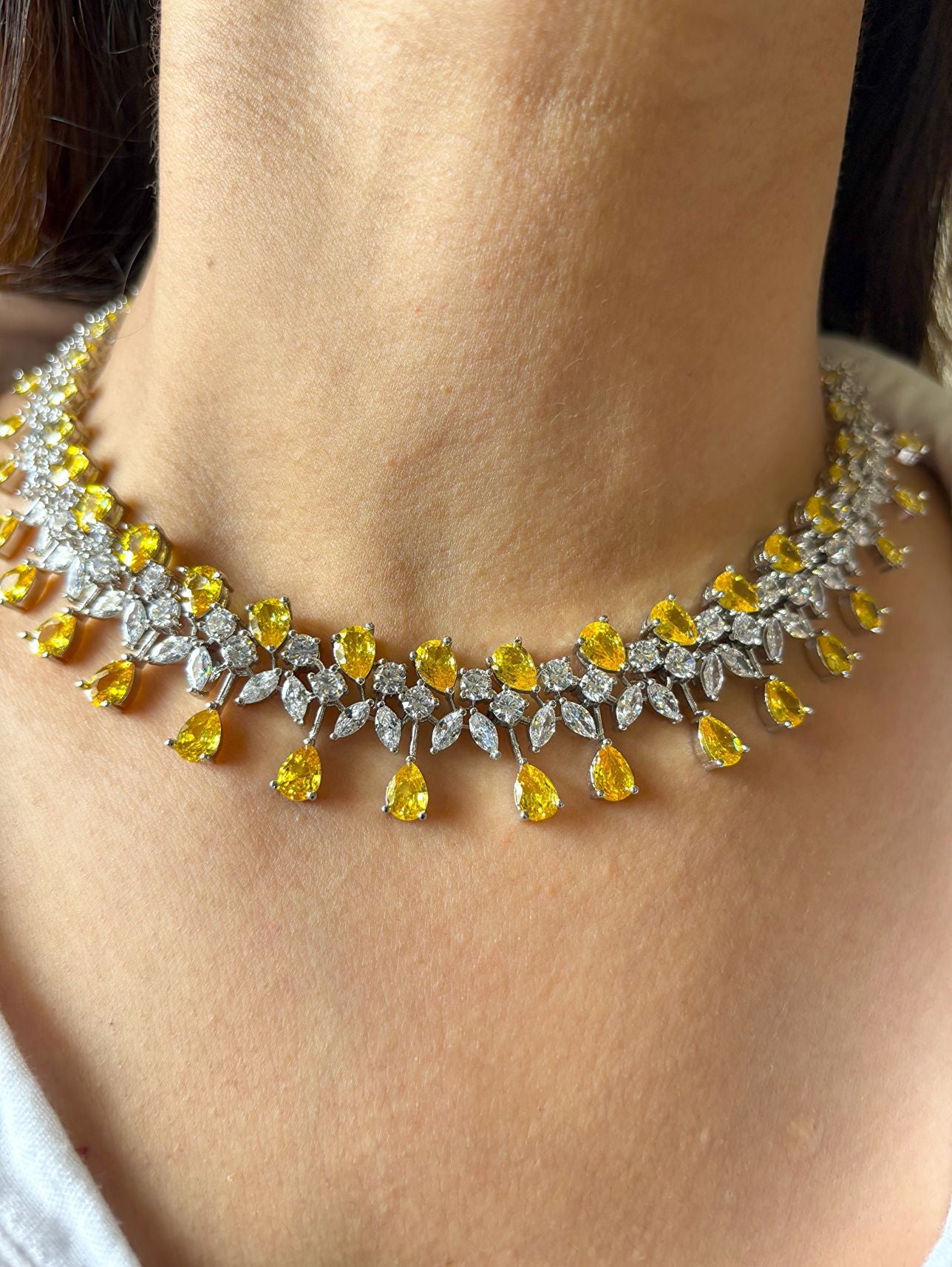 Shop Premium CZ Stones Heavy Sets In Yellow Stones online in India. Explore elegant bridal AD jewellery online. Shop premium bridal jewellery sets in Zircon, AD, Kundan, Victorian Diamond. Collection best suited for Indian weddings, parties and special occasions. Choose AD Necklace In red stone for sarees, lehengas and gowns. -up