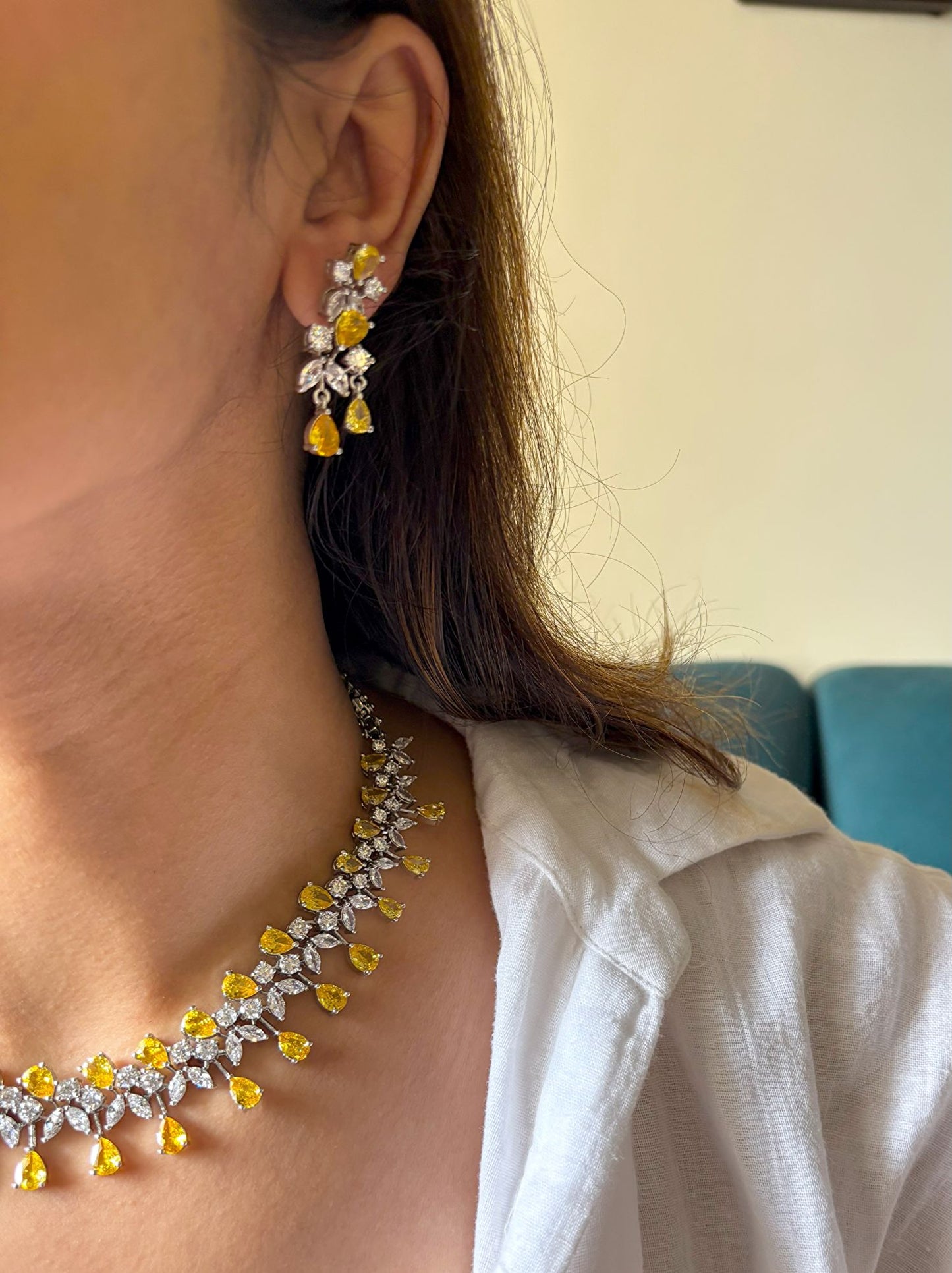 Shop Premium CZ Stones Heavy Sets In Yellow Stones online in India. Explore elegant bridal AD jewellery online. Shop premium bridal jewellery sets in Zircon, AD, Kundan, Victorian Diamond. Collection best suited for Indian weddings, parties and special occasions. Choose AD Necklace In red stone for sarees, lehengas and gowns. -side