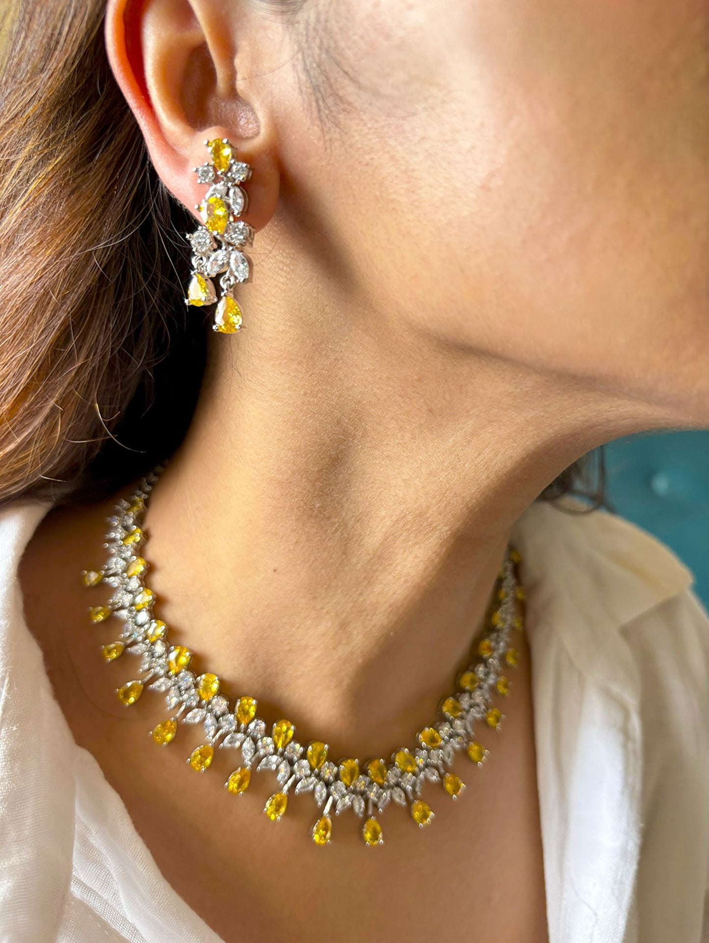 Shop Premium CZ Stones Heavy Sets In Yellow Stones online in India. Explore elegant bridal AD jewellery online. Shop premium bridal jewellery sets in Zircon, AD, Kundan, Victorian Diamond. Collection best suited for Indian weddings, parties and special occasions. Choose AD Necklace In red stone for sarees, lehengas and gowns. -first
