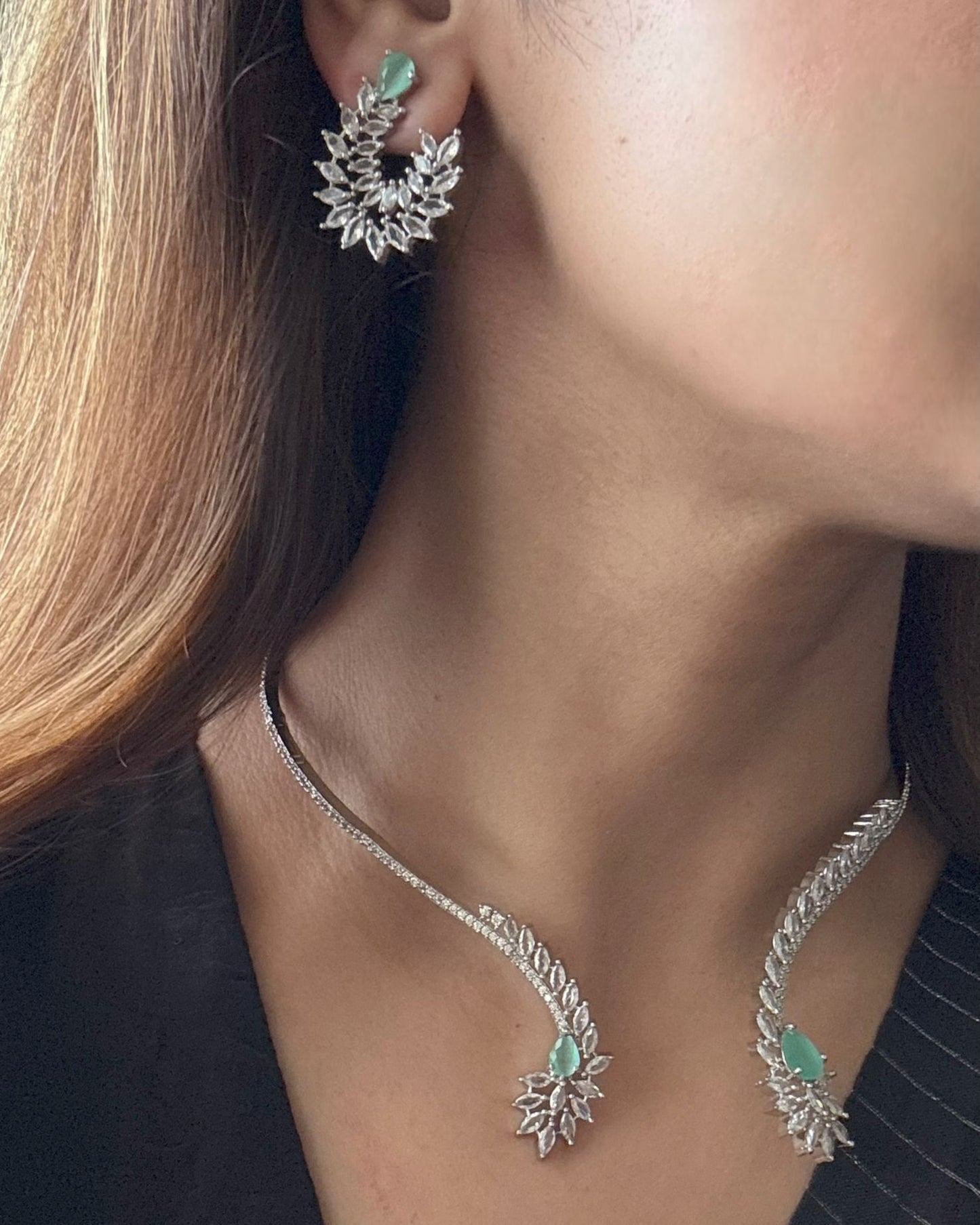 Shop Hasli Set With Floral Design in AD & Mint Green Stone Online in India. Perfect for brides seeking elegant AD jewellery online. Explore premium bridal jewellery online in AD, ideal for Indian weddings and special occasions. Shop AD jewellery in green stone online. -side