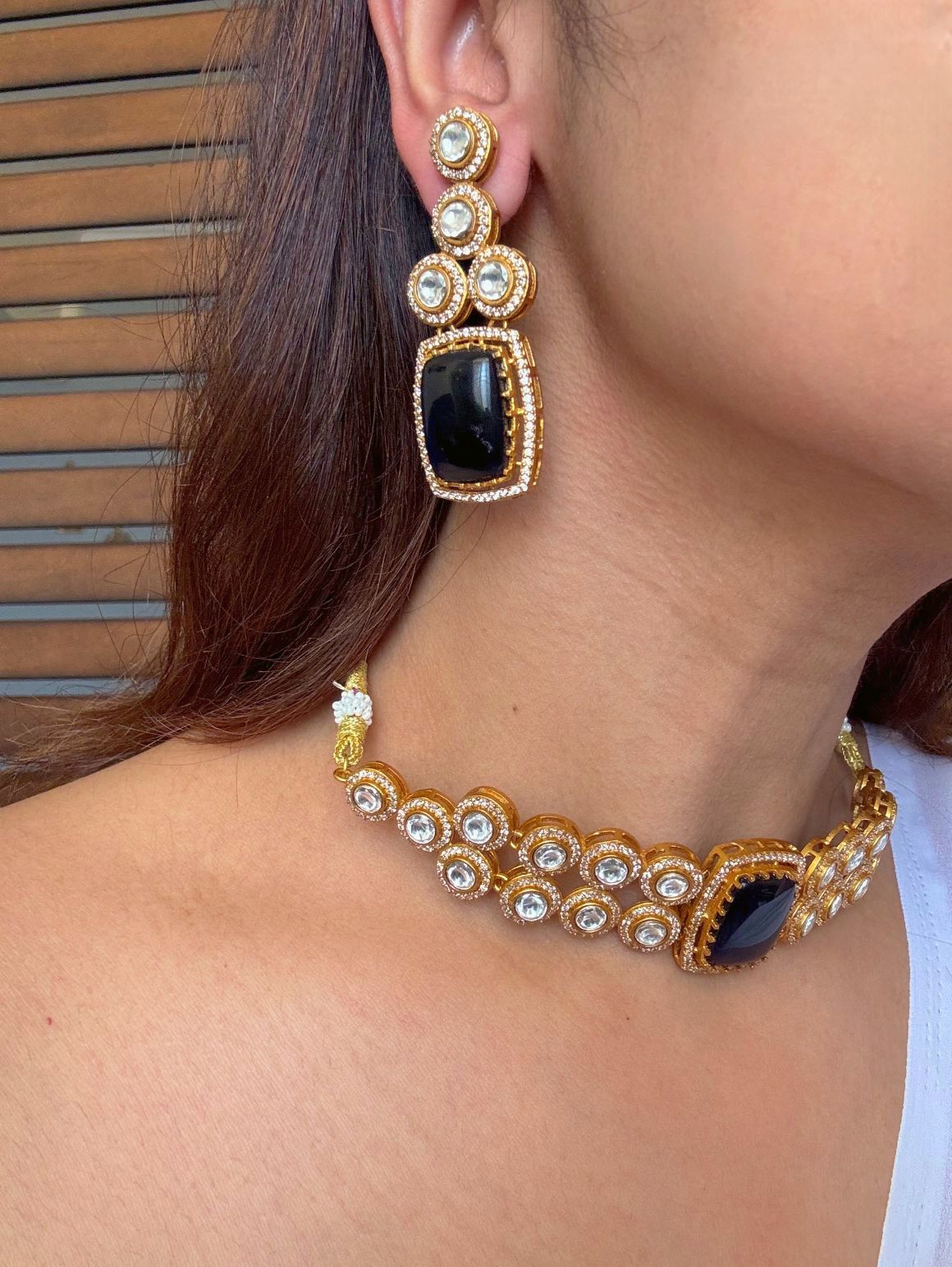 Buy Mankiya Blue Stone Kundan Choker online in India with earrings. Shop an exclusive range of zircon jewellery, Indian wedding jewelry, kundan jewellery, AD earrings, AD necklace. -side