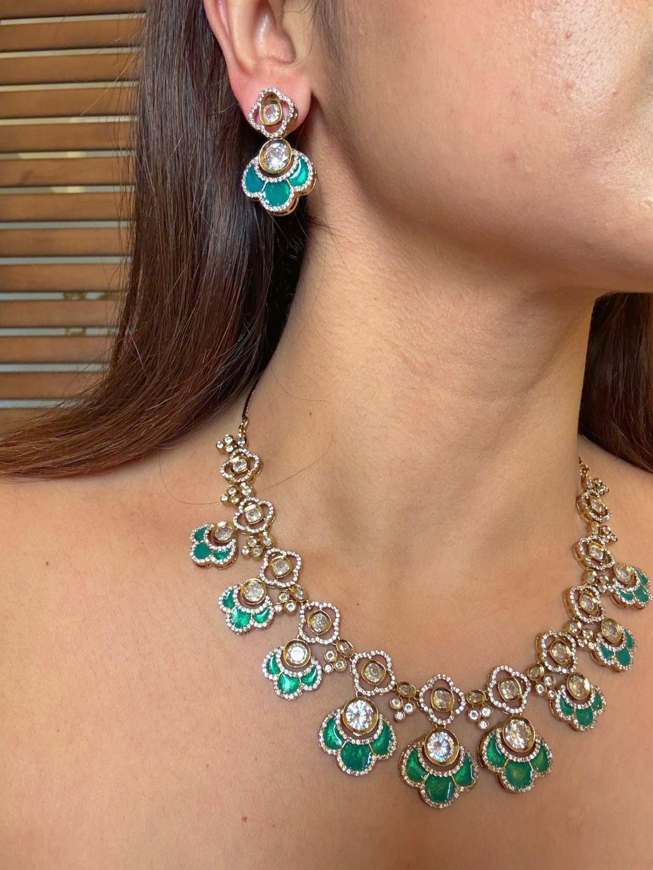 Buy Yogita Kundan AD Gold Polish Necklace In Green online in India. Shop from an exclusive range of CZ jewellery, gold plated, silver plated jewellery. -second