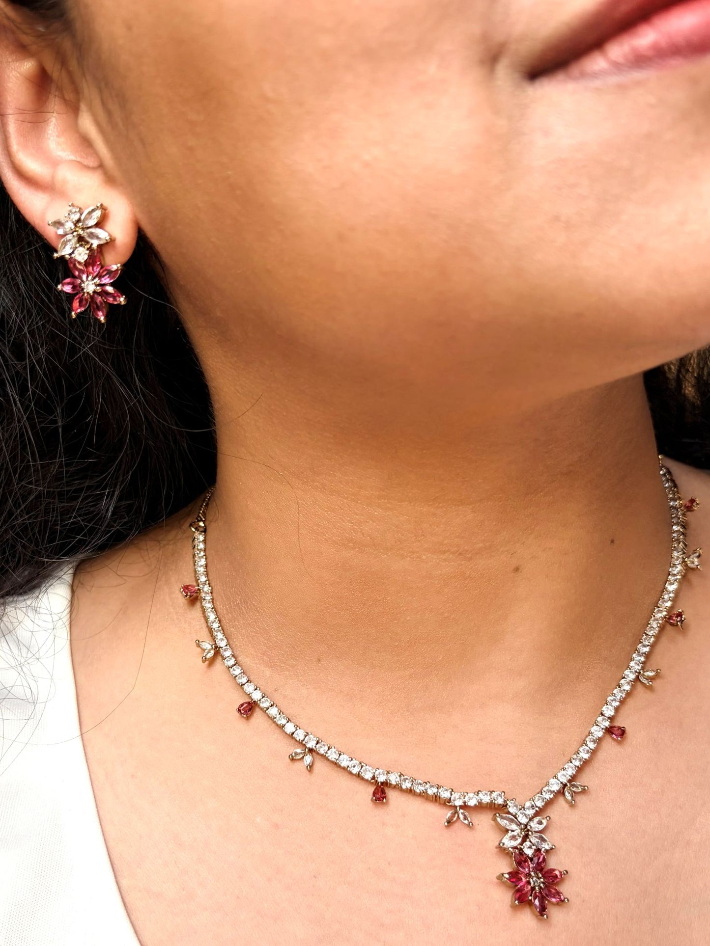 Buy Gulabi Phool AD Necklace with Ruby Floral Earrings online in India. Shop from an exclusive range of jewellery, AD necklace, Kundan necklace for weddings. -side