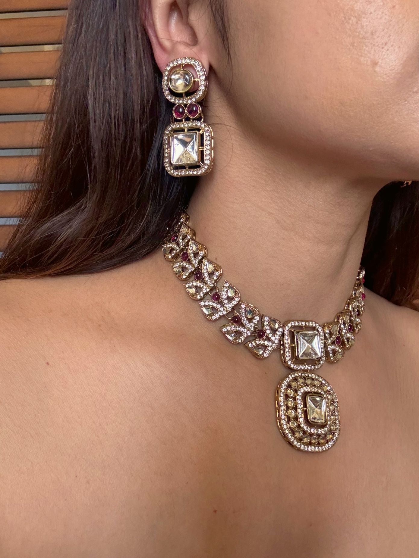 Buy Maahika AD Kundan Necklace In Red With Tikka online in India. Shop from an exclusive range of CZ jewellery, moissanite jewellery, AD necklace, Kundan necklace for weddings. -side