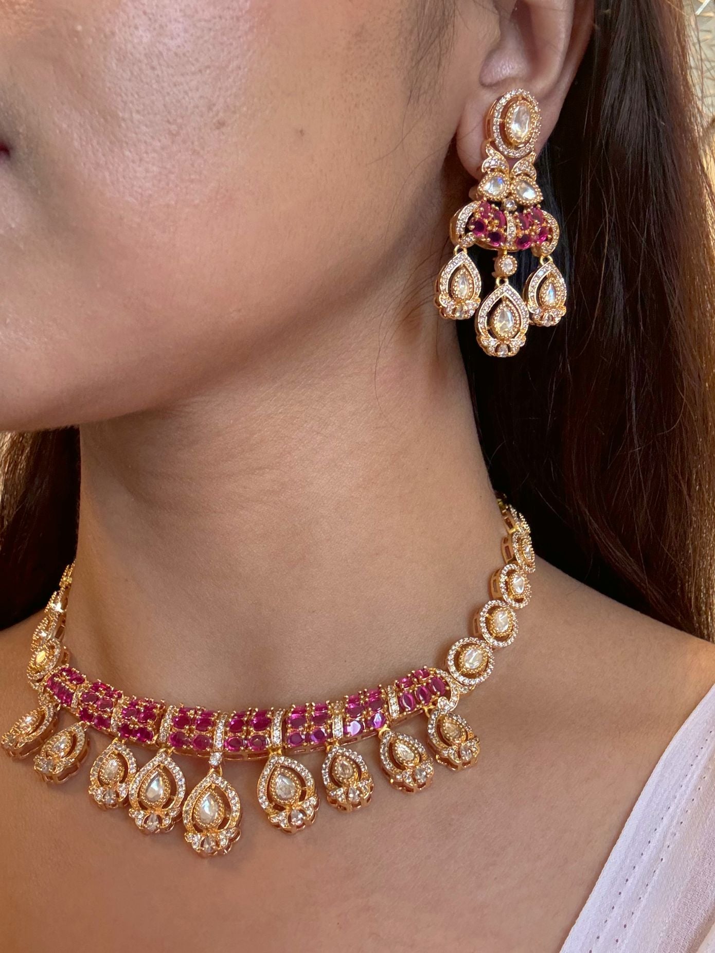 Buy Gold Plated Pink Stone Kundan Bridal Necklace Set online in India. Shop from an exclusive range of jewellery, AD necklace, Kundan necklace for weddings. -side