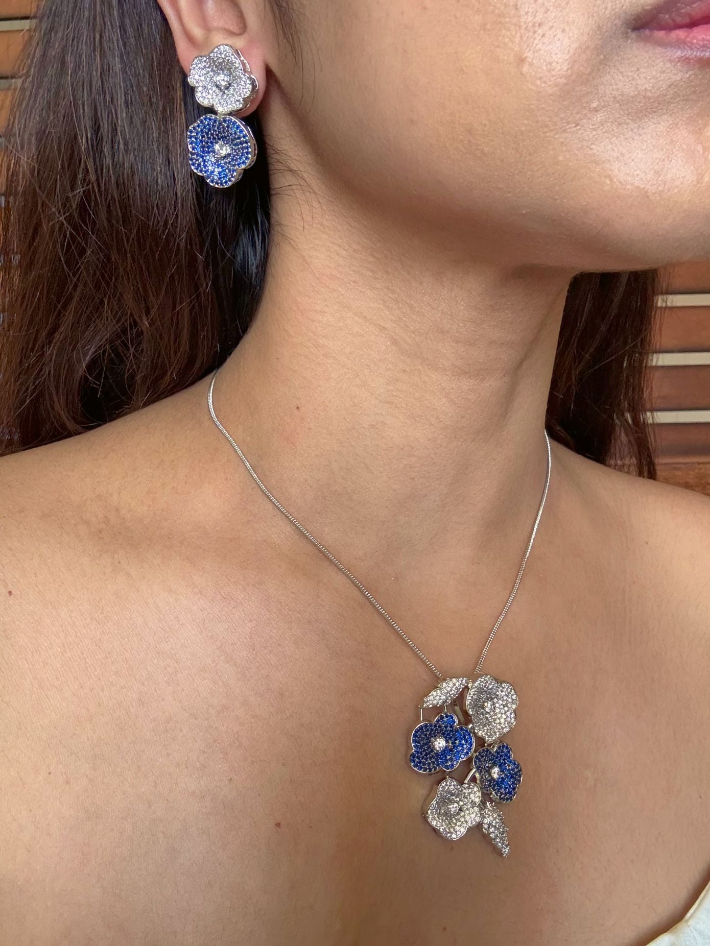 Shop ILA Nano Setting Blue AD Pendant Set With Chain Online in India. Pendant sets in different stones like Kundan, Moissanite, CZ stones and AD stones. -second