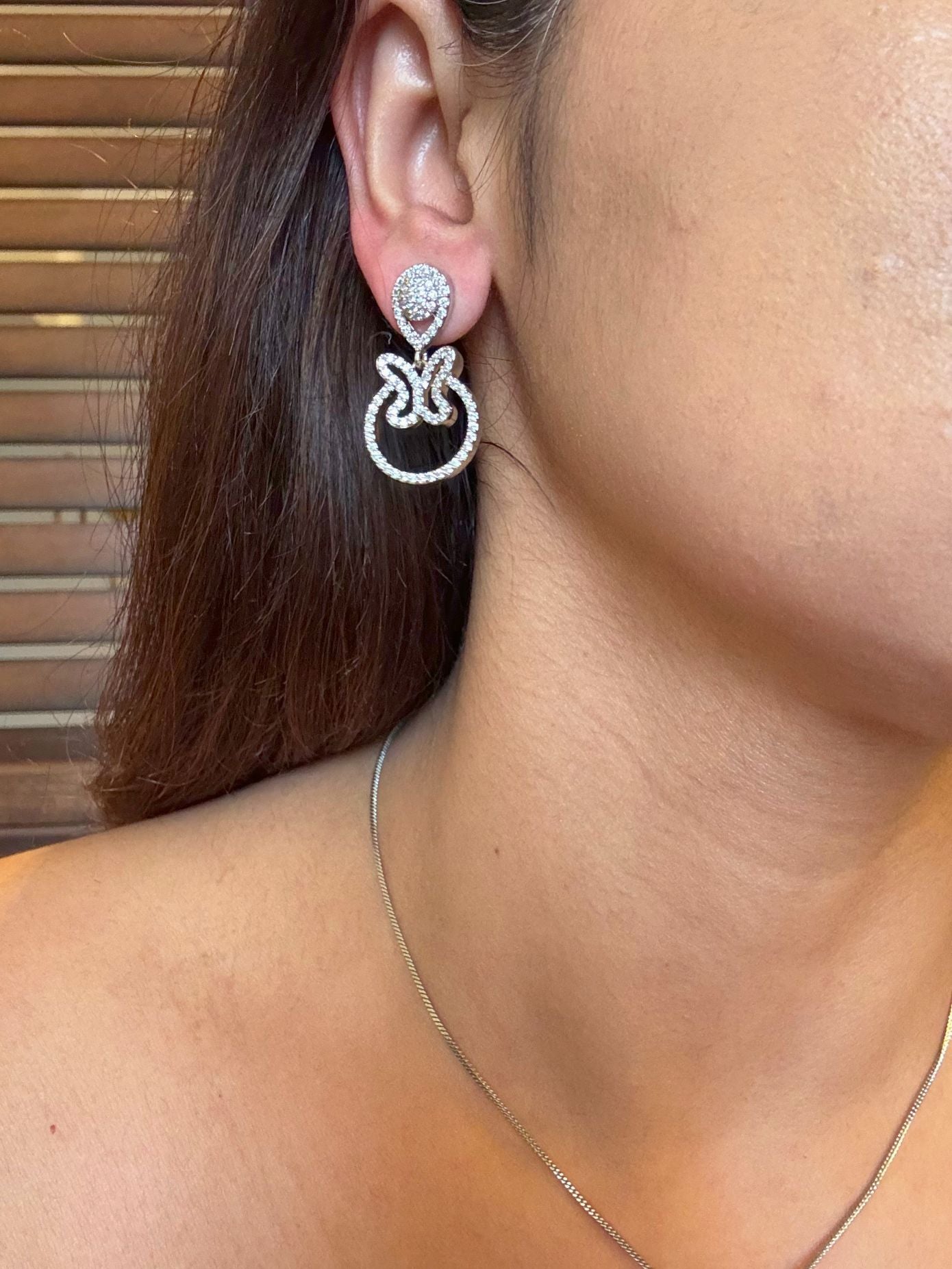 Shop Delicate Round AD Pendant Set With Chain Online in India. Pendant sets in different stones like Kundan, Moissanite, CZ stones and AD stones. -side