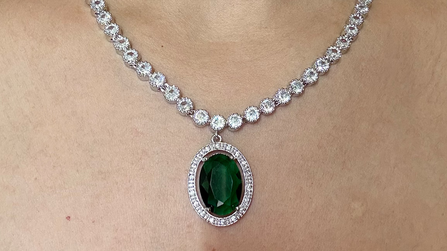 Buy green pendant AD necklace online in India with earrings. Shop an exclusive range of zircon jewellery, Indian wedding jewelry, kundan jewellery, AD earrings, AD necklace.-closeup