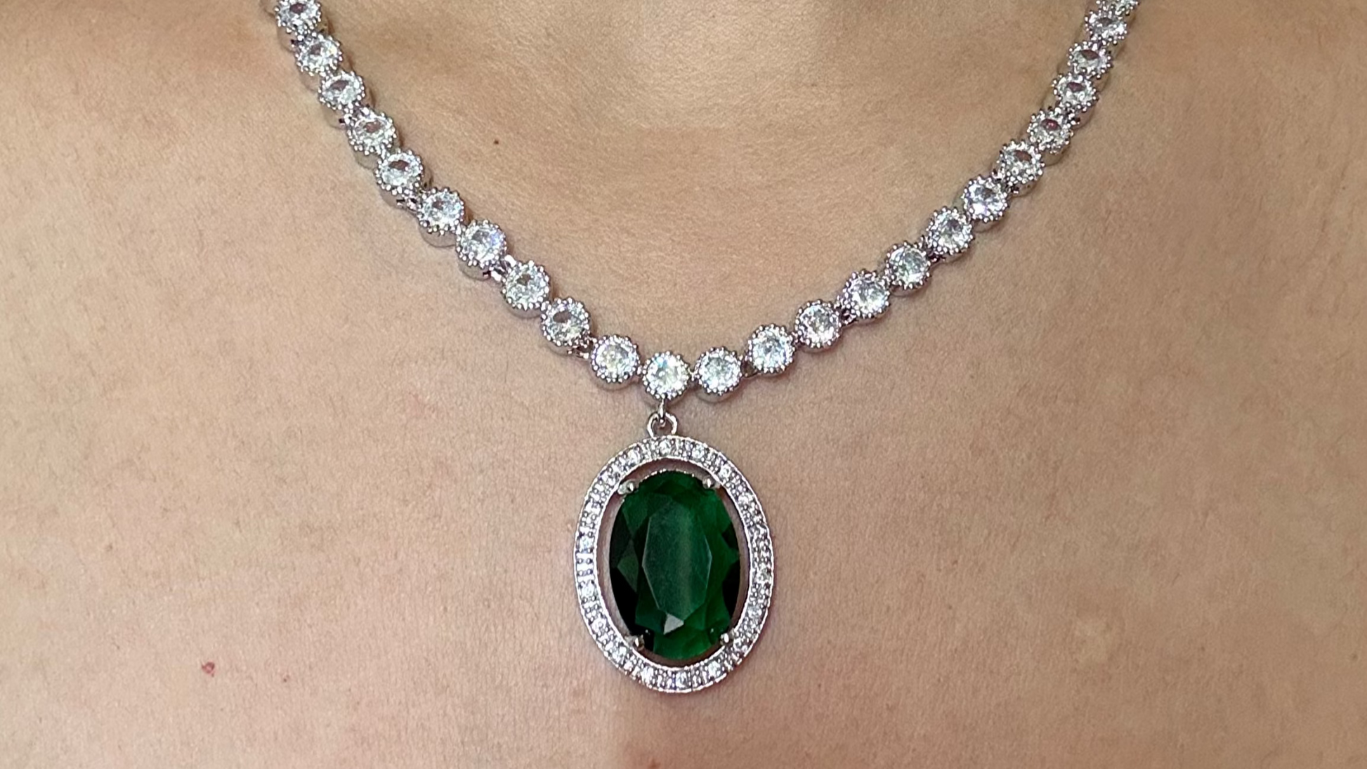 Buy green pendant AD necklace online in India with earrings. Shop an exclusive range of zircon jewellery, Indian wedding jewelry, kundan jewellery, AD earrings, AD necklace.-closeup