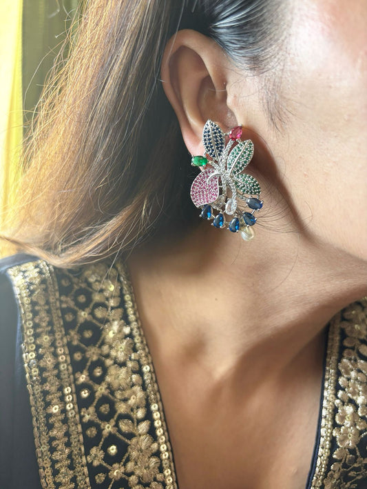 Shop women's stylish multi-colored stones AD earrings online in India. Shop from an exclusive range of zircon jewellery, bridal wedding jewelry, silver plated earrings, rhodium plated jewellery, AD earrings, AD necklace sets for weddings, engagement, receptions and office events. -closeup