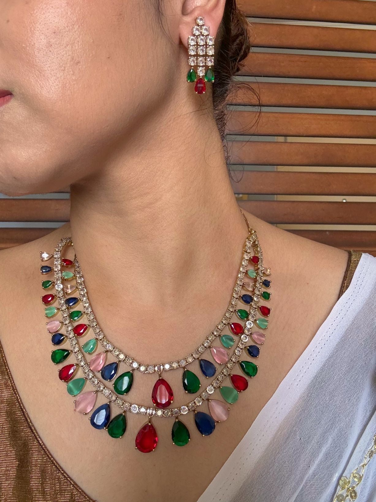 Buy statement necklaces for weddings online in India with earrings. Shop an exclusive range of CZ, Indian wedding kundan jewellery, AD necklace both bridal and siders. 