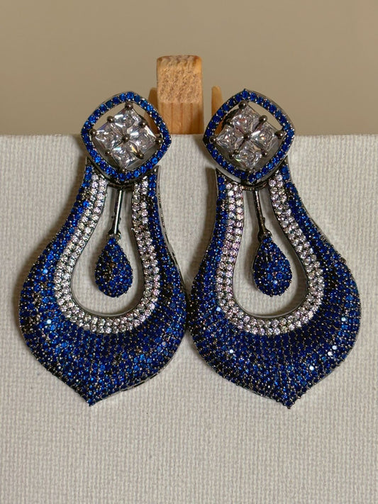 Shop celebrity look long AD Earrings online in blue stones. Shop from an exclusive range of zircon earrings, bridal AD jewelry, silver plated earrings, rhodium plated jewellery, AD earrings, AD earrings sets for coats, gowns and lehengas.  -first