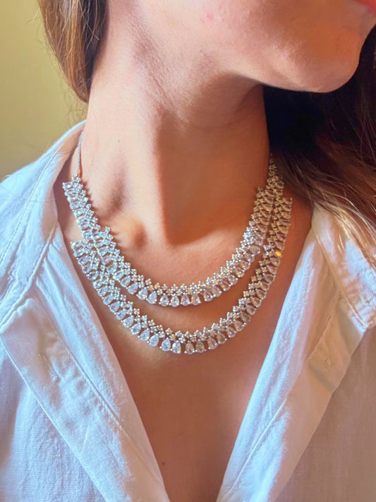 Shop Diamond Look bridal AD Necklace in India. Explore elegant bridal AD jewellery online. Shop premium bridal jewellery sets in Zircon, AD, Kundan, Victorian Diamond. Collection best suited for Indian weddings, parties and special occasions. Choose Diamond AD strings for sarees, lehengas and coats. -Front