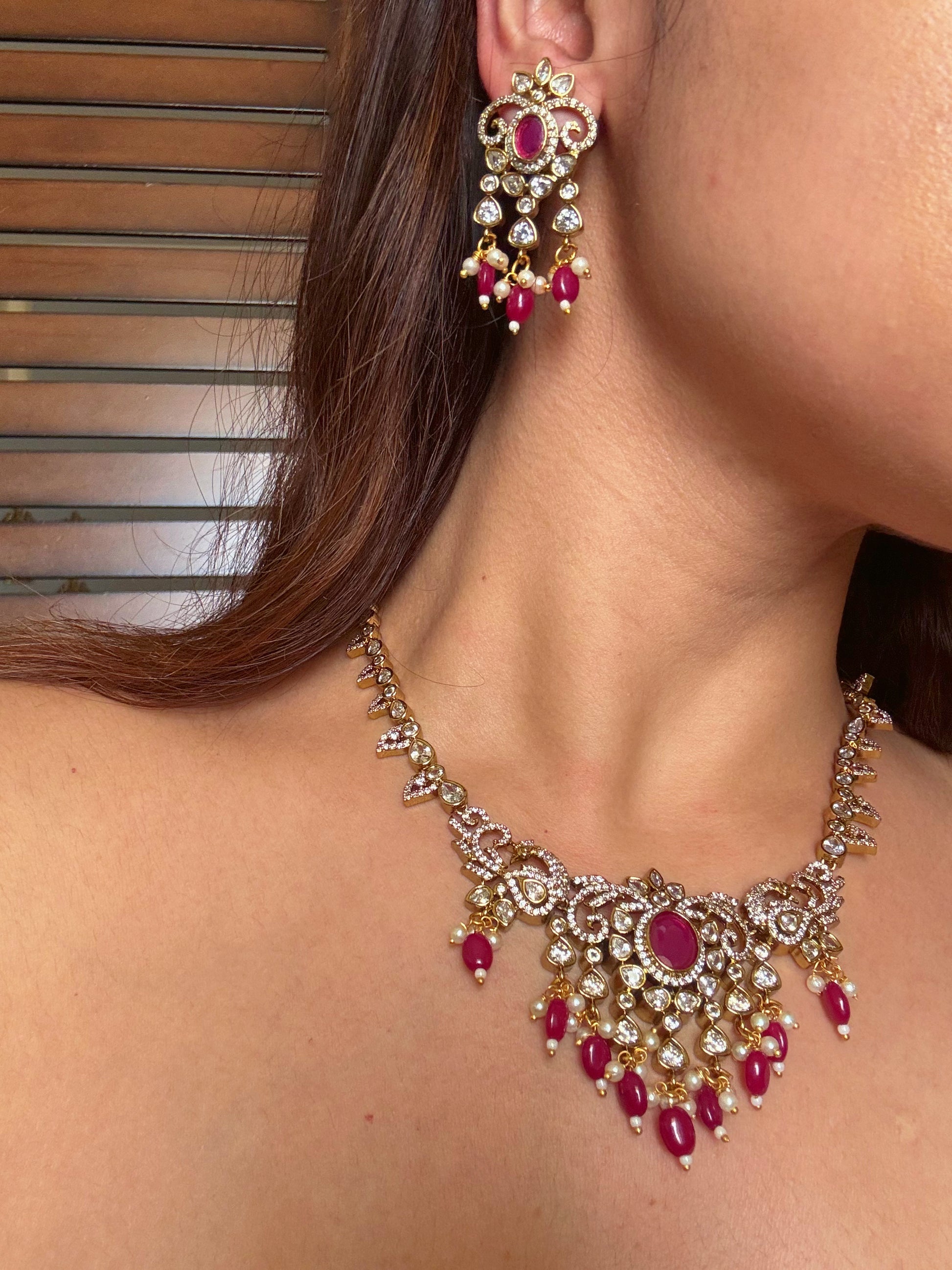 Shop kundan and ruby gold plated necklace set online in India. Shop from an exclusive range of CZ jewellery, gold plated, silver plated jewellery, gold polish earrings. -earrings