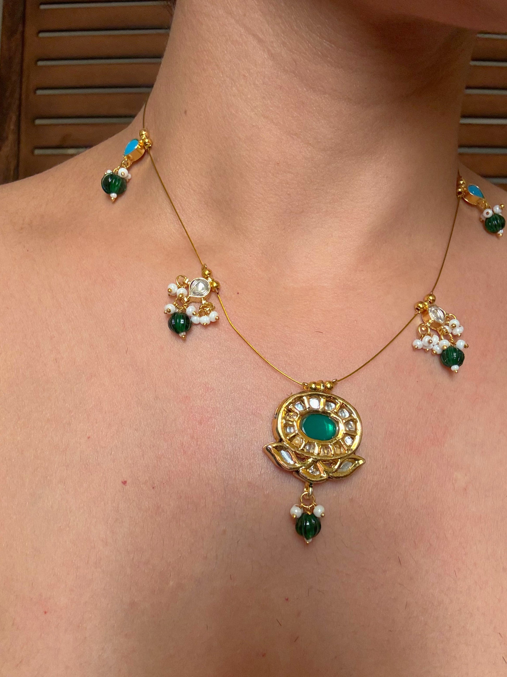 Buy gold plated kundan and pearl motif wire necklace online in India. Shop from an exclusive range of CZ jewellery, gold plated, silver plated jewellery, gold polish earrings. -full view