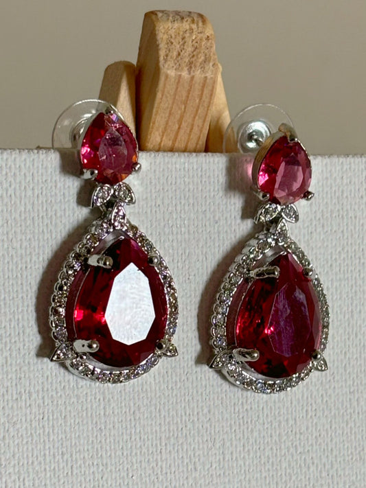 Shop Celebrity Look Double Drop Red Stone AD Earrings online. Shop from an exclusive range of zircon earrings, bridal AD jewelry, silver plated earrings, rhodium plated jewellery, AD earrings, AD necklace sets for coats, gowns and lehengas.  -first