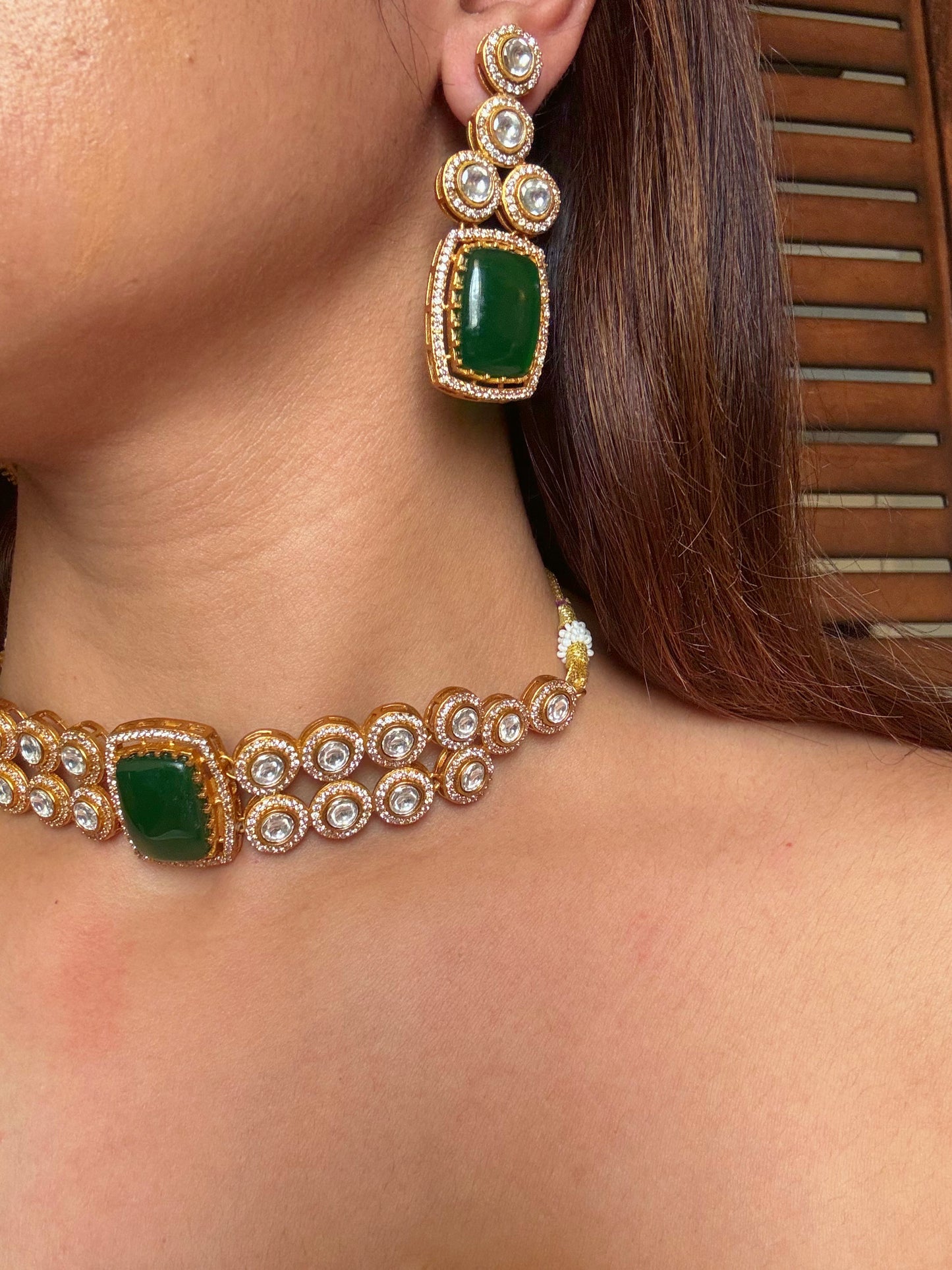 Shop mankiya green stone kundan choker set online in India. Shop from an exclusive range of CZ jewellery, gold plated, silver plated jewellery, gold polish earrings. -full view
