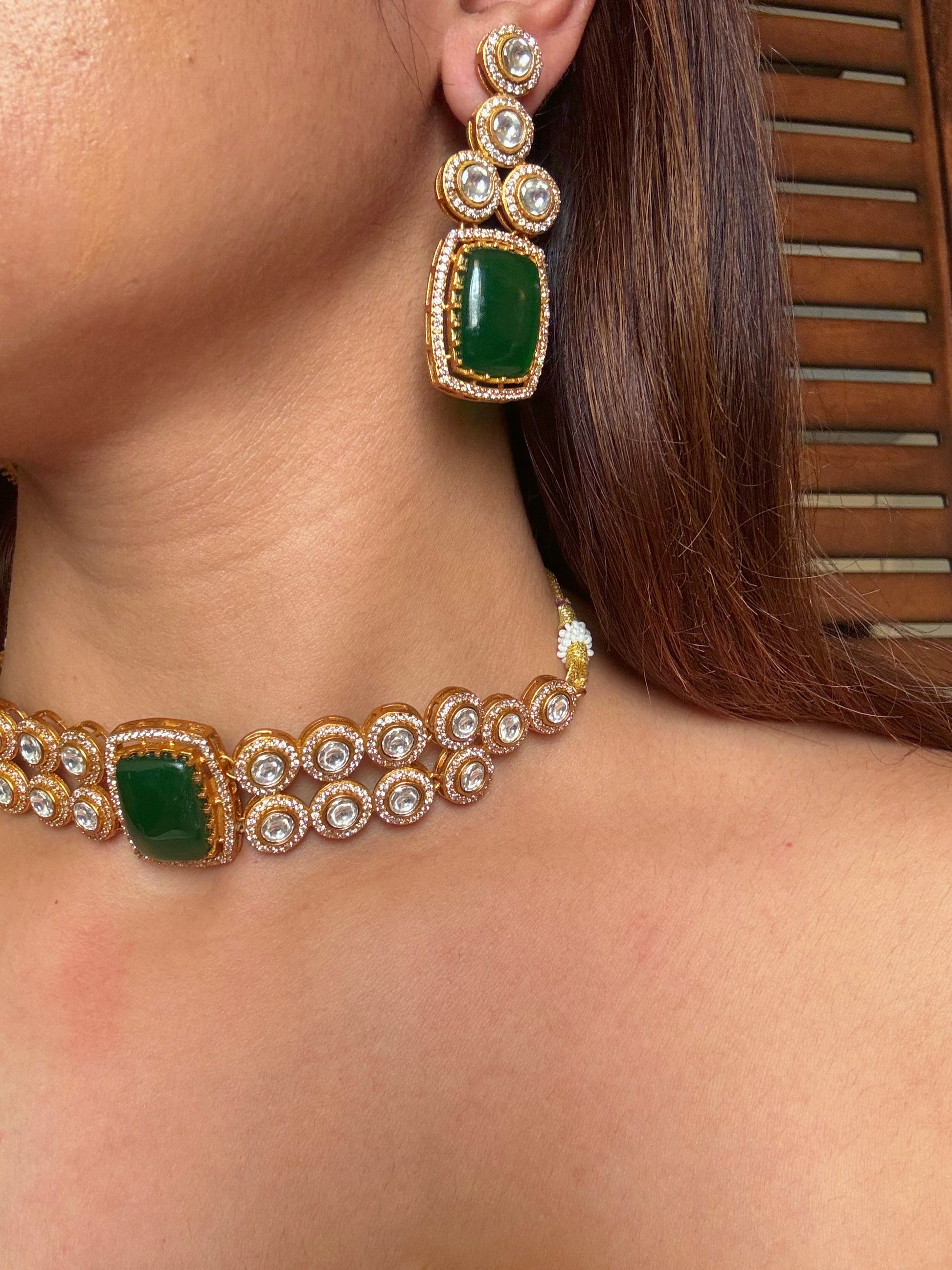 Shop mankiya green stone kundan choker set online in India. Shop from an exclusive range of CZ jewellery, gold plated, silver plated jewellery, gold polish earrings. -full view