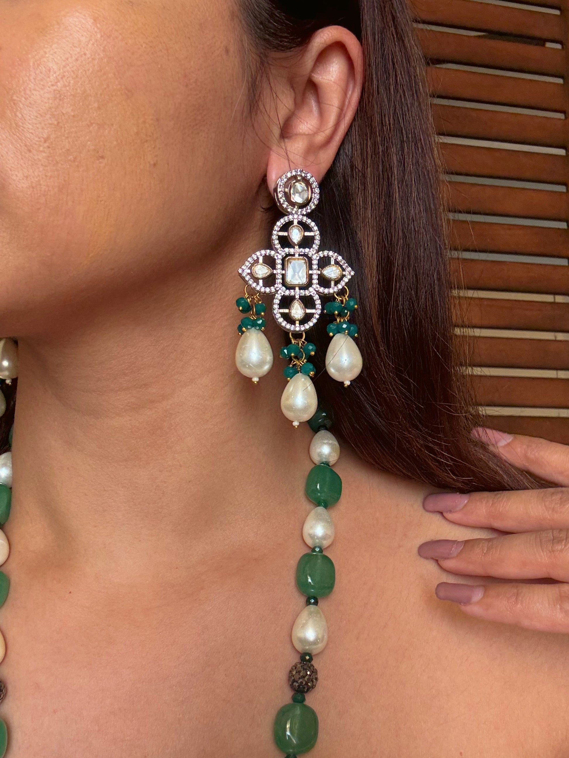 Shop pearl and emerald long kundan necklace set online in India. Shop from an exclusive range of CZ jewellery, gold plated, silver plated jewellery, gold polish earrings. -earrings