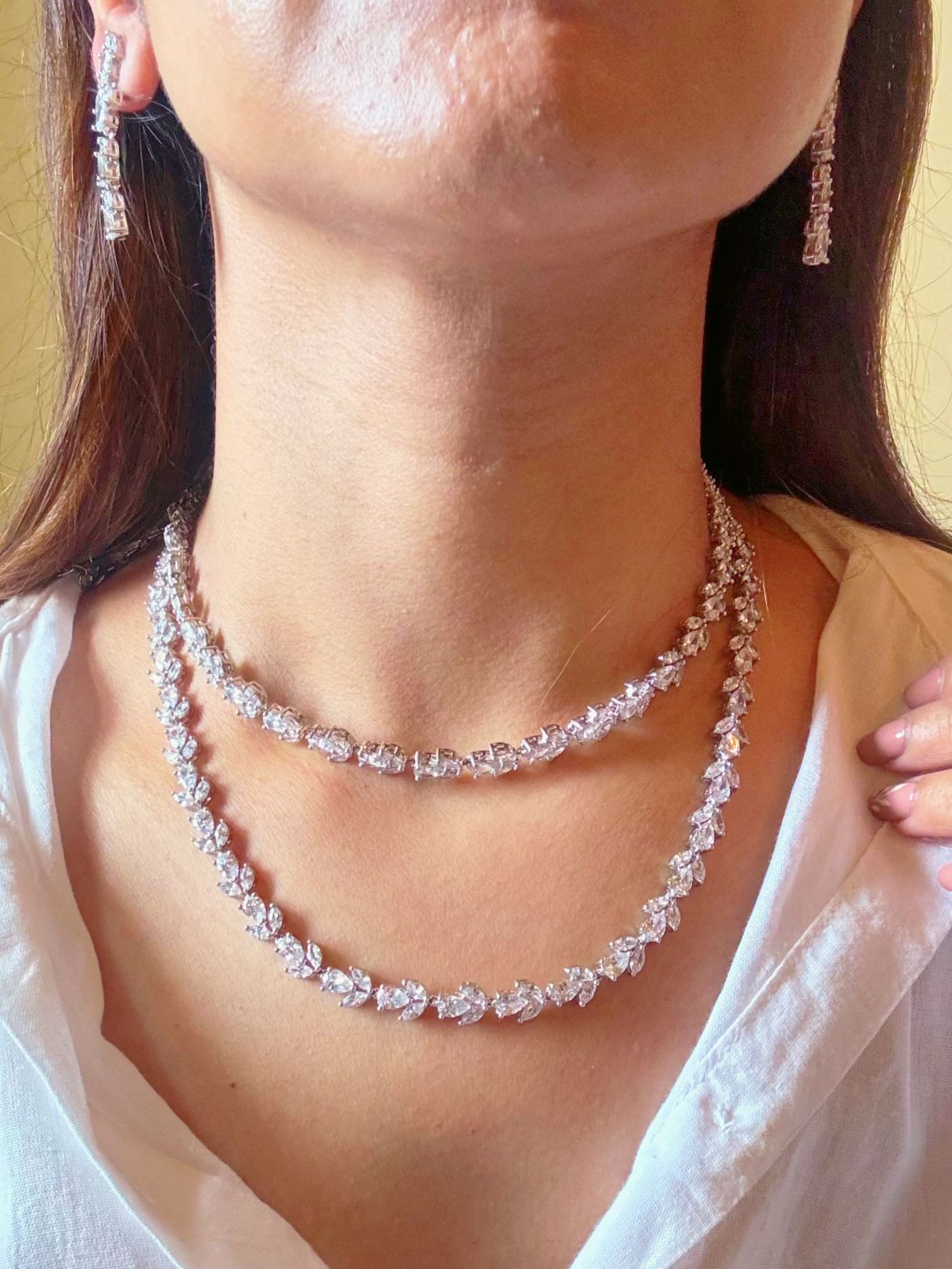 Shop Diamond AD String Necklace in India. Explore elegant bridal AD jewellery online. Shop premium bridal jewellery sets in Zircon, AD, Kundan, Victorian Diamond. Collection best suited for Indian weddings, parties and special occasions. Choose Diamond AD strings for sarees, lehengas and coats. - Long