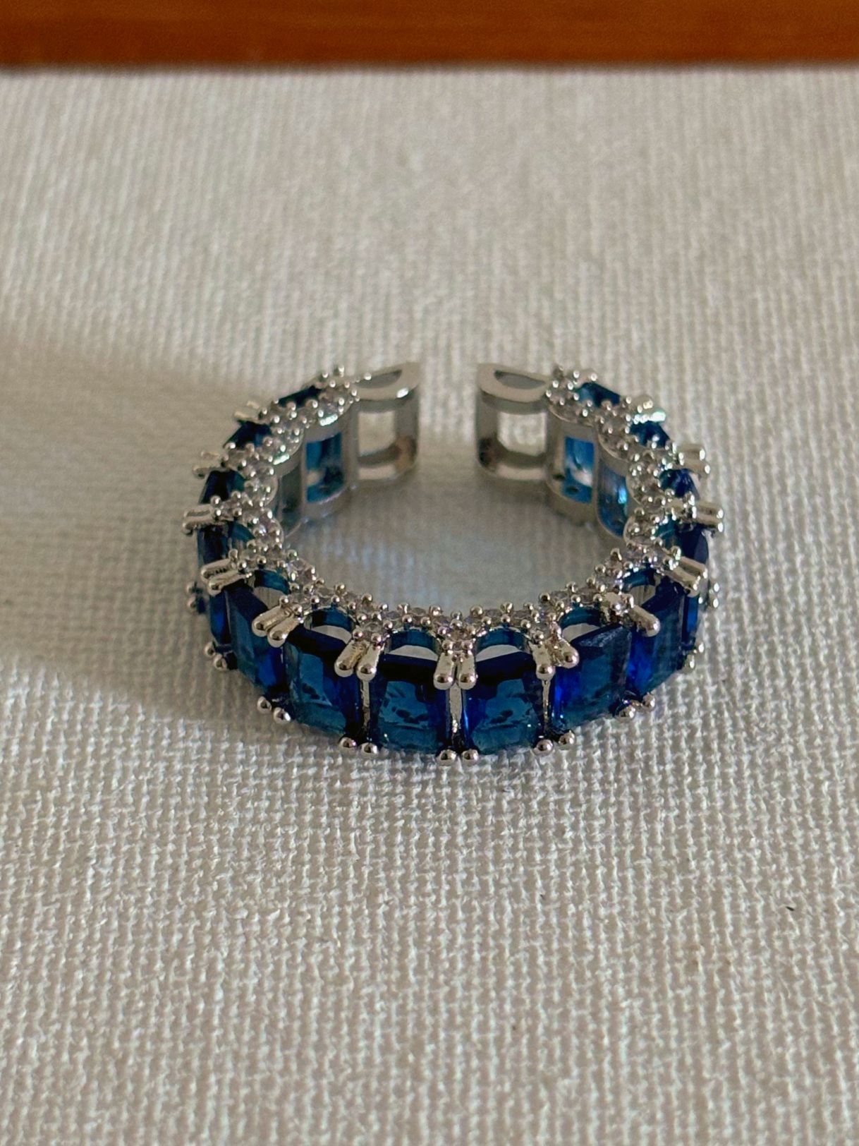 Shop Adjustable Green Baguette Stone Stack Ring online in India. Shop from an exclusive range of zircon jewellery, bridal wedding jewellery, silver plated earrings, rhodium plated rings, AD rings, AD earrings for office parties, cocktail dresses and sangeet night. -back