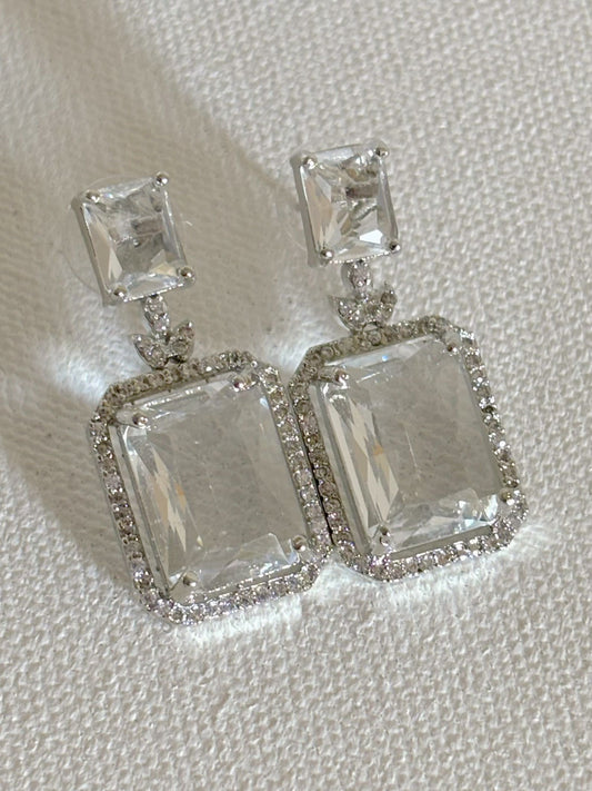 Shop women's luxury white doublet stone AD earrings online in India. Shop from an exclusive range of zircon jewellery, Indian wedding jewelry, gold plated earrings, rhodium plated jewellery, AD earrings, AD necklace sets for weddings and festive occasions. -front