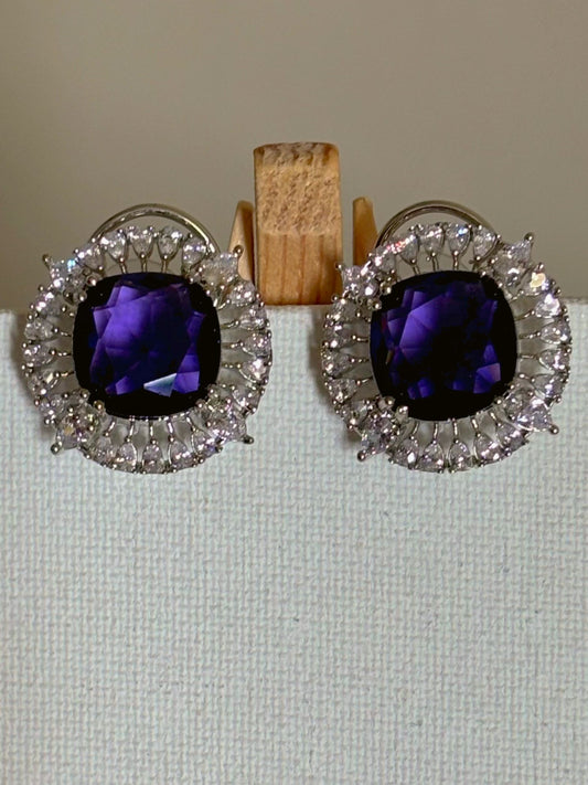 Shop Contemporary Studs In AD & Purple stone online. Shop from an exclusive range of zircon earrings, bridal AD jewelry, silver plated earrings, rhodium plated jewellery, AD earrings, AD necklace sets for weddings, engagements and parties. -front 