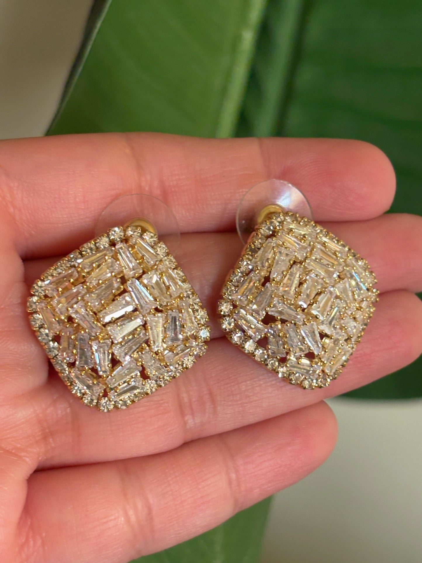Shop gold plated AD studs online in India. Shop from an exclusive range of CZ jewellery, gold plated, silver, mehendi polish earrings. -closeup