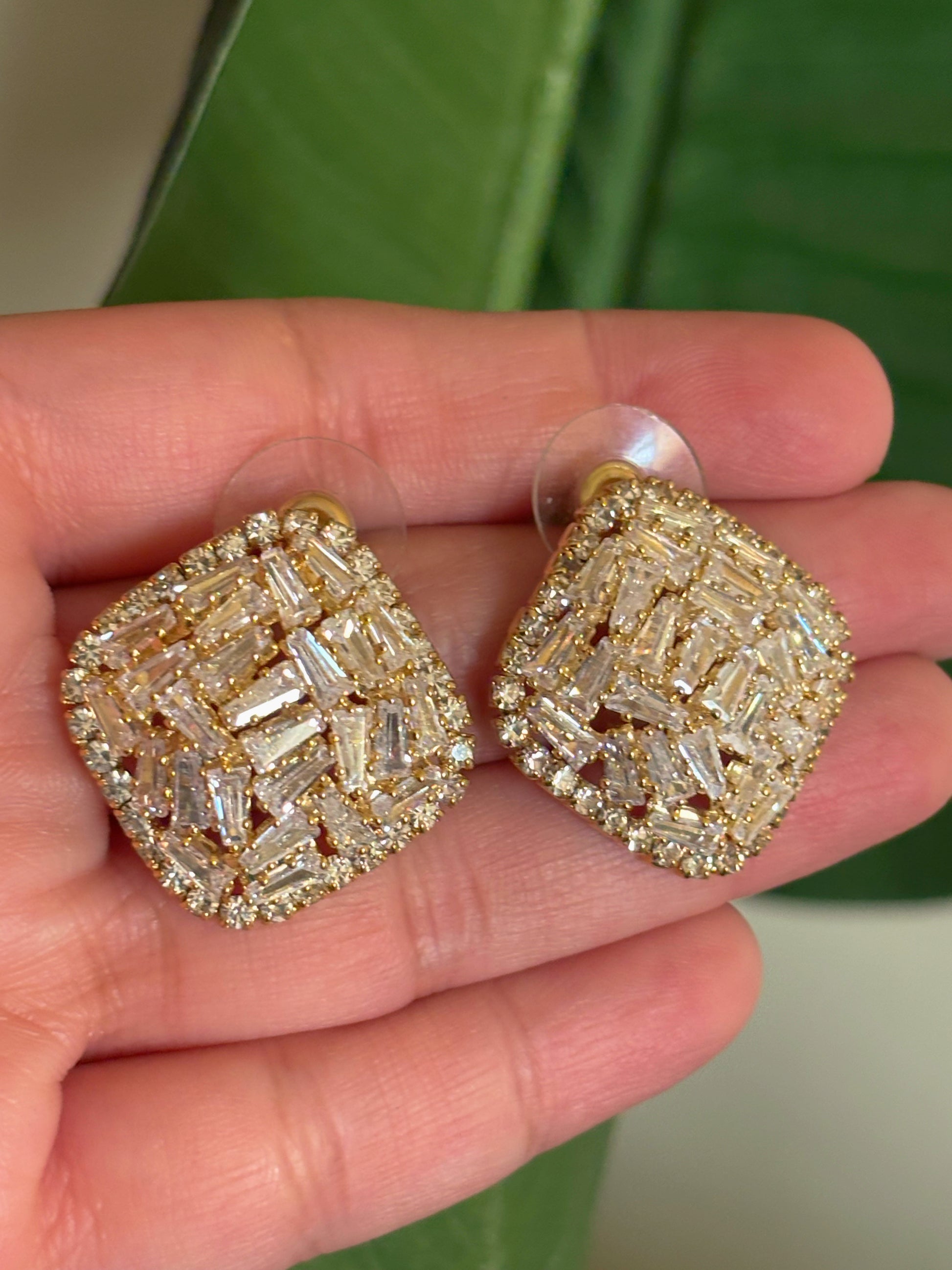 Shop gold plated AD studs online in India. Shop from an exclusive range of CZ jewellery, gold plated, silver, mehendi polish earrings. -closeup