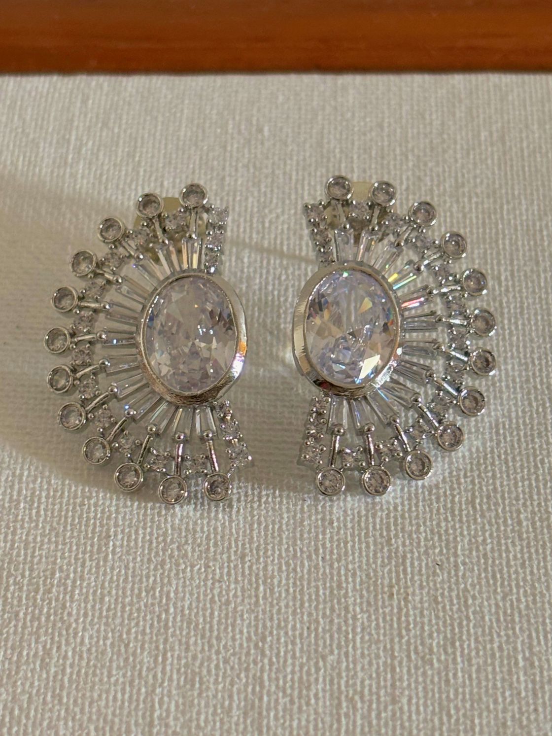 Shop women's luxury white stone AD ear cuffs online. Shop from an exclusive range of zircon earrings, bridal AD jewelry, silver plated earrings, rhodium plated jewellery, AD earrings, AD necklace sets for weddings, engagements and parties.  -front