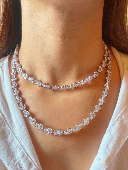 Shop Diamond AD String Necklace in India. Explore elegant bridal AD jewellery online. Shop premium bridal jewellery sets in Zircon, AD, Kundan, Victorian Diamond. Collection best suited for Indian weddings, parties and special occasions. Choose Diamond AD strings for sarees, lehengas and coats. -Front