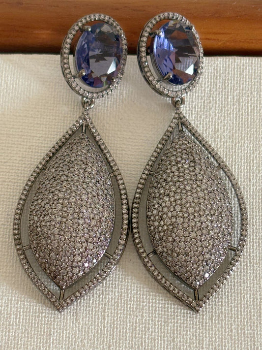 Shop women's Designer Nano Setting AD Earrings With Purple Stone online in India. Shop from an exclusive range of zircon jewellery, bridal wedding jewelry, silver plated earrings, rhodium plated jewellery, AD earrings, AD necklace sets for Lehengas, suits, sarees and gowns. -front