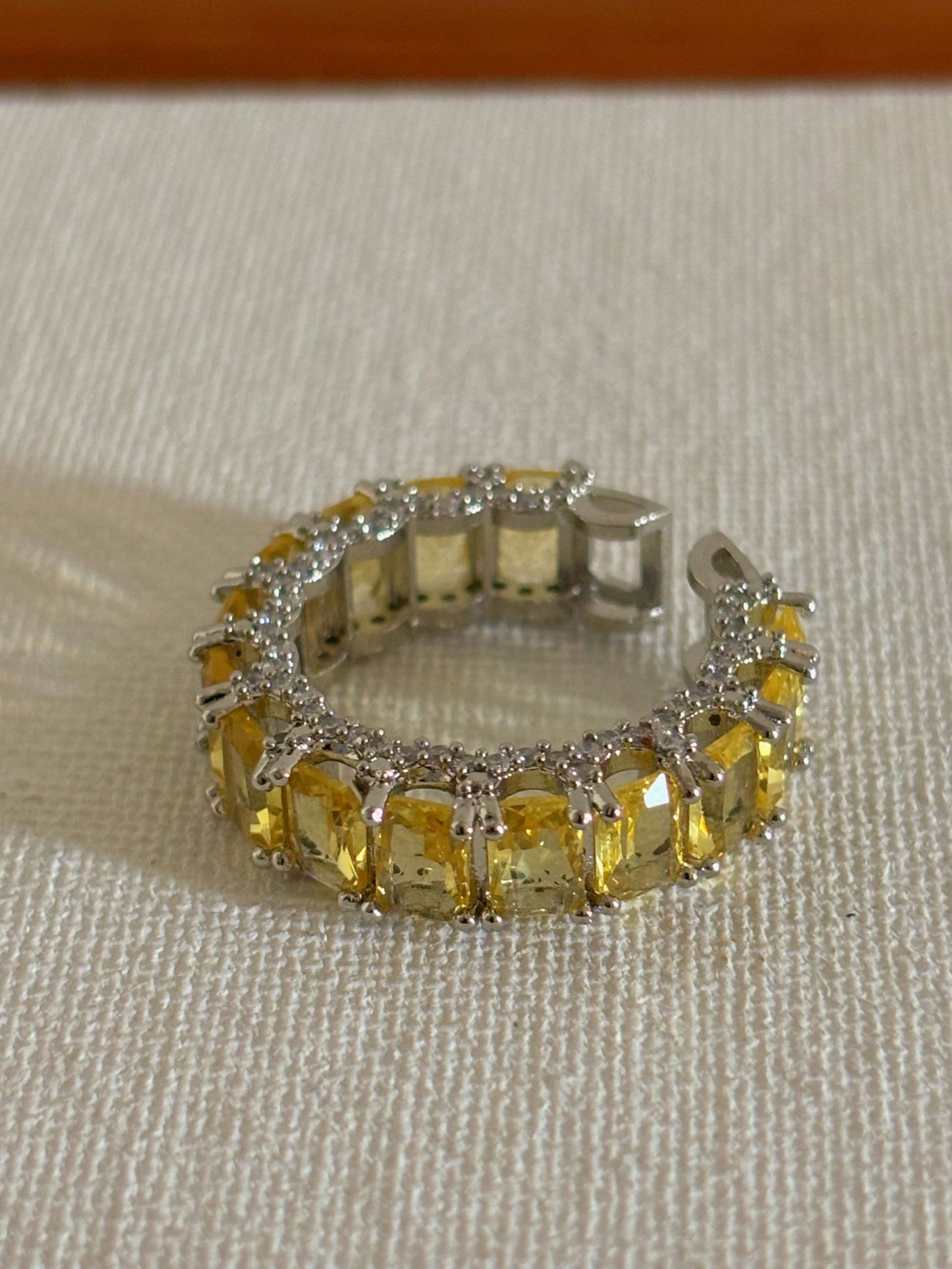 Shop Adjustable Yellow Baguette Stone Stack Ring online in India. Shop from an exclusive range of zircon jewellery, bridal wedding jewellery, silver plated earrings, rhodium plated rings, AD rings, AD earrings for office parties, cocktail dresses and sangeet night. -flat