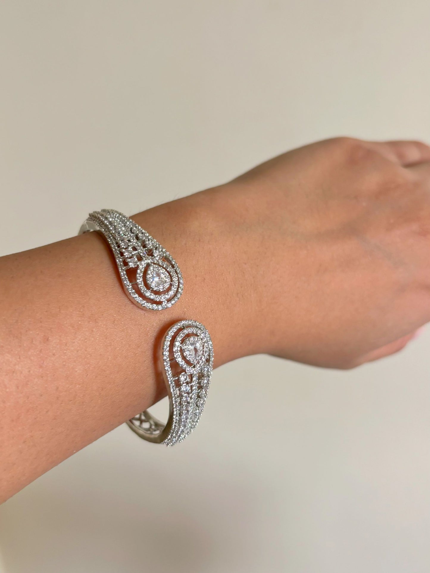 Shop Sleek Celebrity Look AD Bracelet In Rhodium Polish online in India. Shop from an exclusive range of zircon jewellery, bridal wedding jewellery, silver plated earrings, rhodium plated rings, AD rings, AD earrings for weddings, engagement, cocktail night & parties. -side