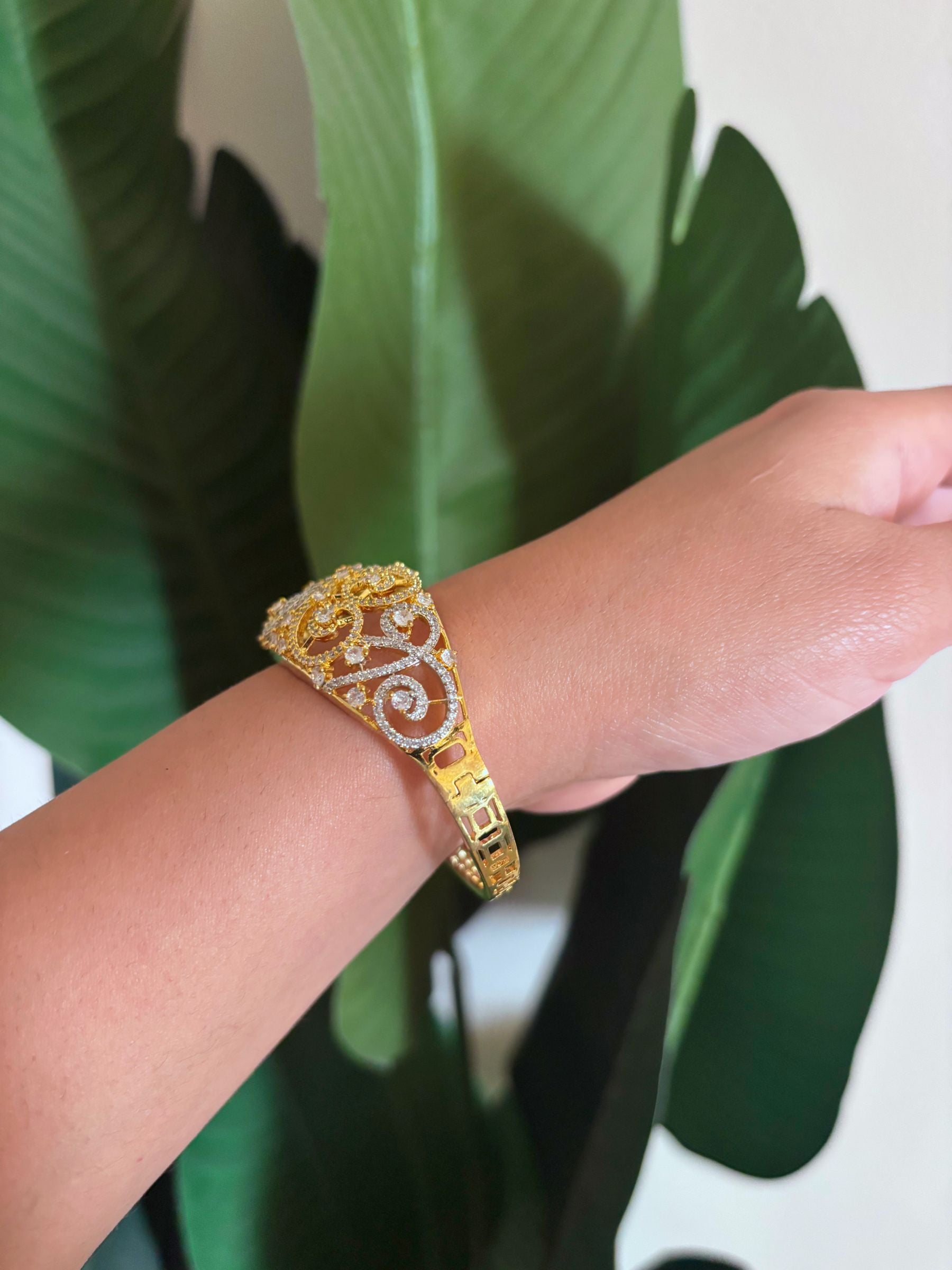 Buy Malini Heavy AD Bracelet In Gold & Silver Polish online in India. Shop from an exclusive range of zircon jewellery, bridal wedding jewellery, AD rings & bracelets.  -second