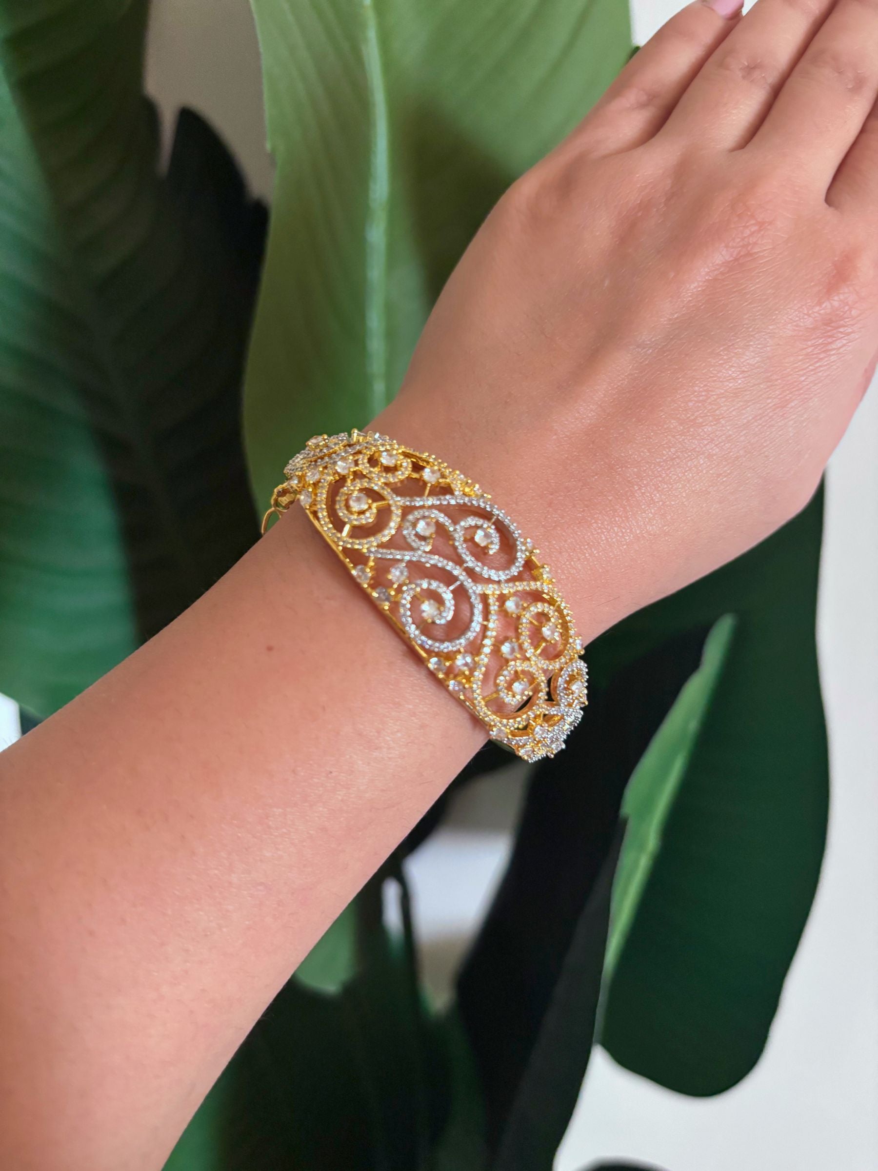 Buy Malini Heavy AD Bracelet In Gold & Silver Polish online in India. Shop from an exclusive range of zircon jewellery, bridal wedding jewellery, AD rings & bracelets. -second