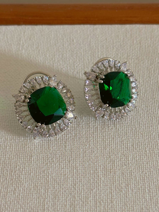 Shop Contemporary Studs In AD & Green Stone online. Shop from an exclusive range of zircon earrings, bridal AD jewelry, silver plated earrings, rhodium plated jewellery, AD earrings, AD necklace sets for weddings, engagements and parties.  -front