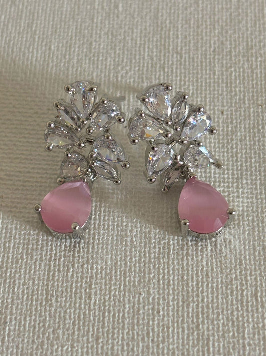 Shop Subtle Glow Pink Stone Drop AD Earrings online in India. Shop from an exclusive range of zircon jewellery, bridal wedding jewelry, silver plated earrings, rhodium plated jewellery, AD earrings, AD necklace sets for Lehengas, suits, sarees and gowns. -front