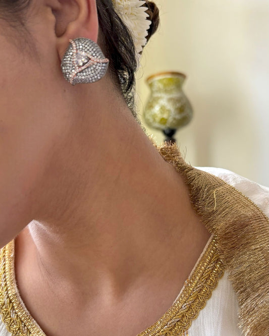 Shop Antique Finish Nano Setting Studs In AD online in India. Shop from an exclusive range of zircon jewellery, Indian wedding jewelry, gold plated earrings, rhodium plated jewellery, AD earrings, AD necklace sets for weddings, engagements and parties. -front