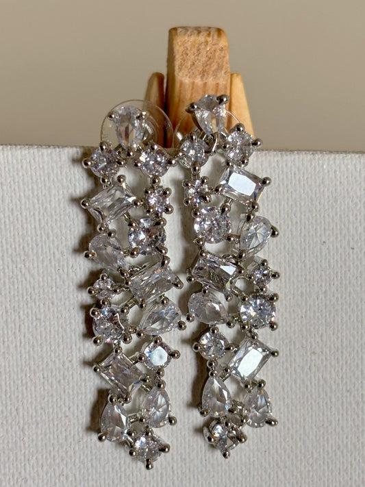 Shop Celebrity Look Long AD Earrings In White online in India. Shop from an exclusive range of zircon jewellery, bridal wedding jewelry, silver plated earrings, rhodium plated jewellery, AD earrings, AD necklace sets for Lehengas, suits, sarees and gowns.  -front