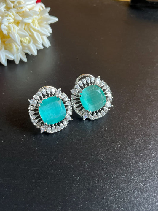 Shop Big Studs In AD & Mint Green Doublet Stone online. Shop from an exclusive range of zircon earrings, bridal AD jewelry, AD earrings, AD necklace sets.