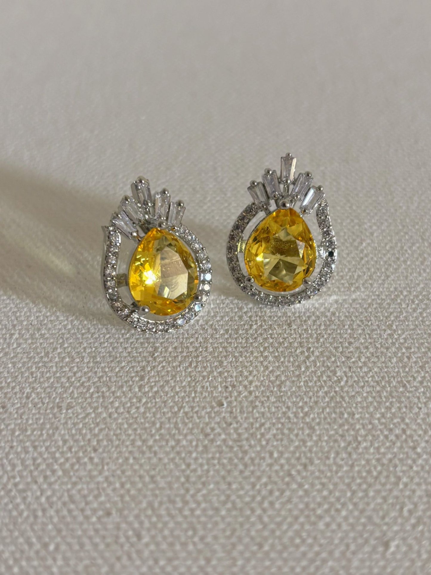 Shop Celebrity Studs In AD & Yellow Doublet Stone online. Shop AD earrings, bridal AD jewelry, AD necklace sets for weddings, engagements and parties. -front 