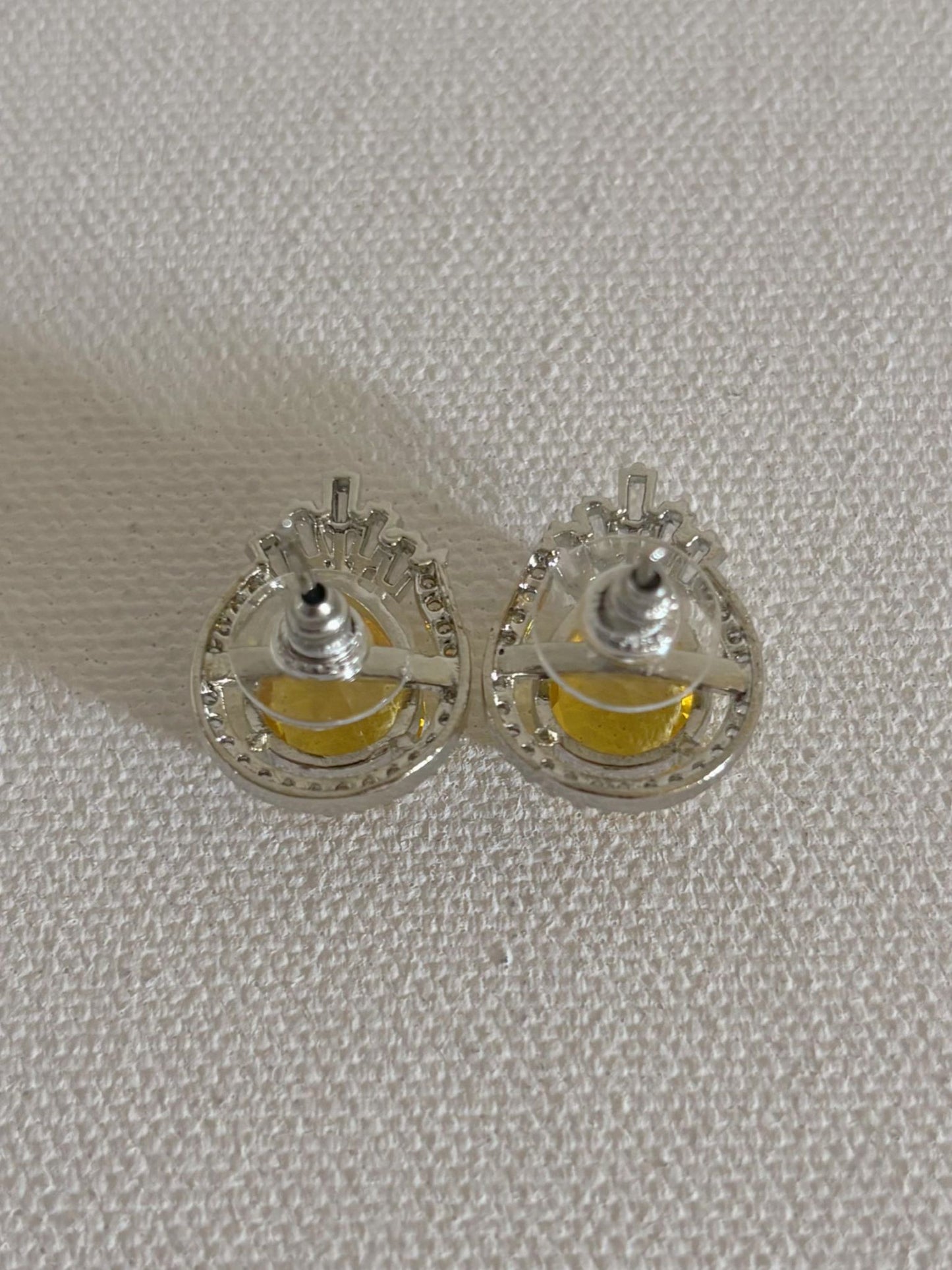 Shop Celebrity Studs In AD & Yellow Doublet Stone online. Shop AD earrings, bridal AD jewelry, AD necklace sets for weddings, engagements and parties. -back