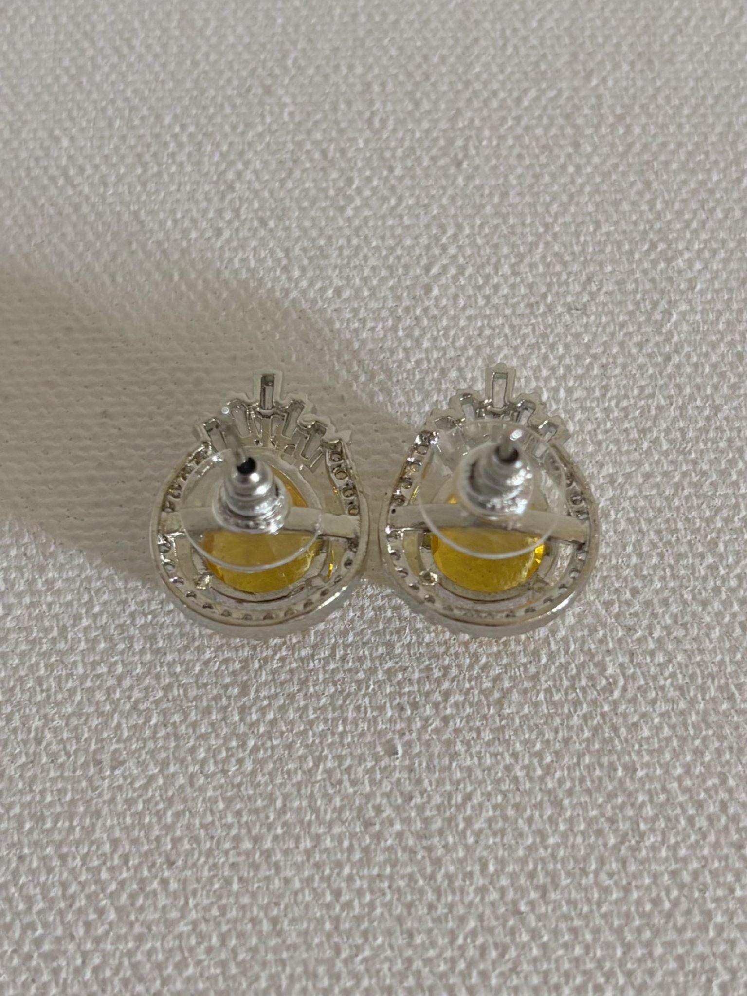 Shop Celebrity Studs In AD & Yellow Doublet Stone online. Shop AD earrings, bridal AD jewelry, AD necklace sets for weddings, engagements and parties. -back