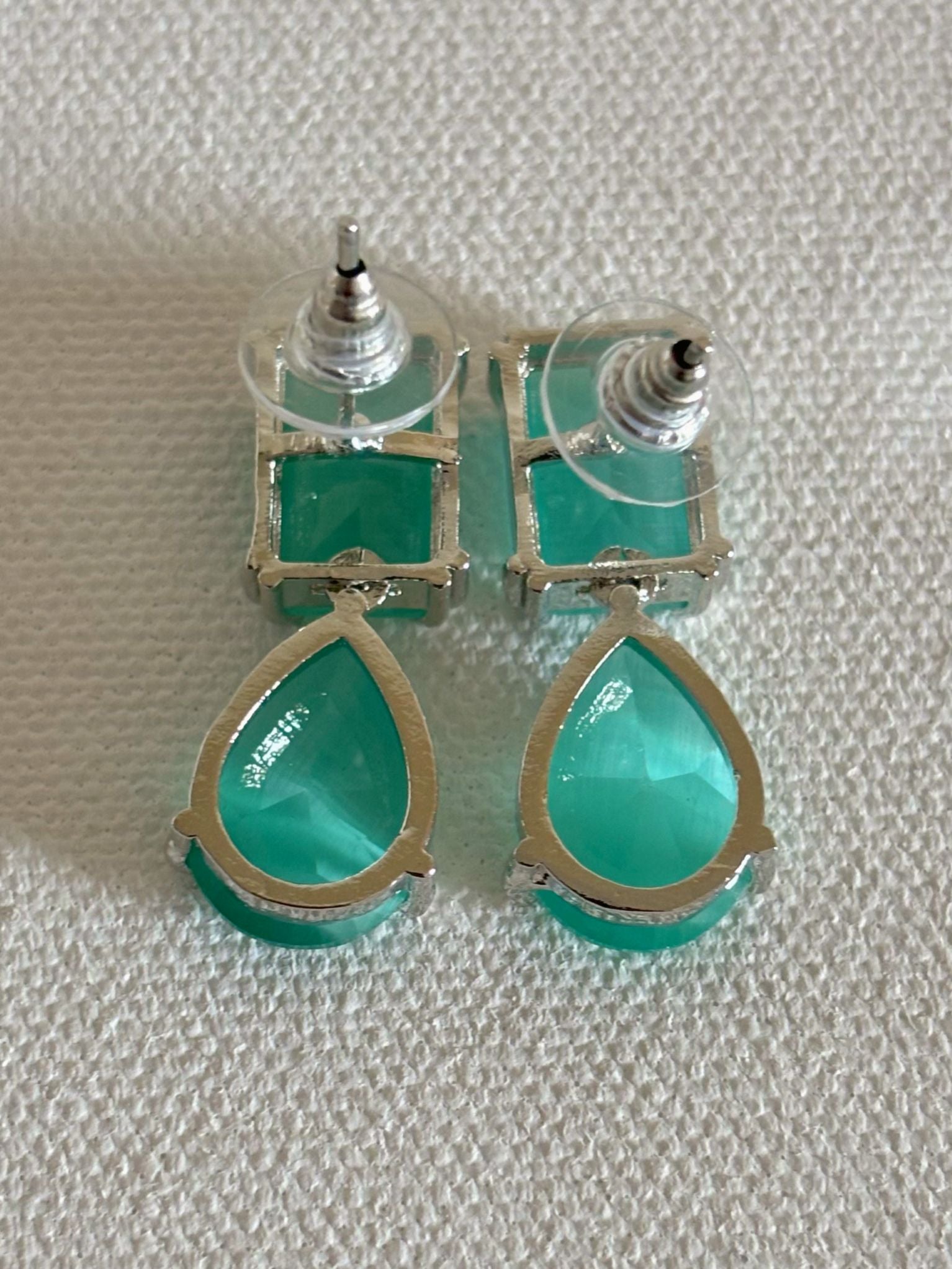 Shop Zara Mint Green Doublet Stone Earrings online. Shop AD earrings, bridal AD jewelry, kundan and AD party necklace sets for sarees, gowns and lehengas. -back