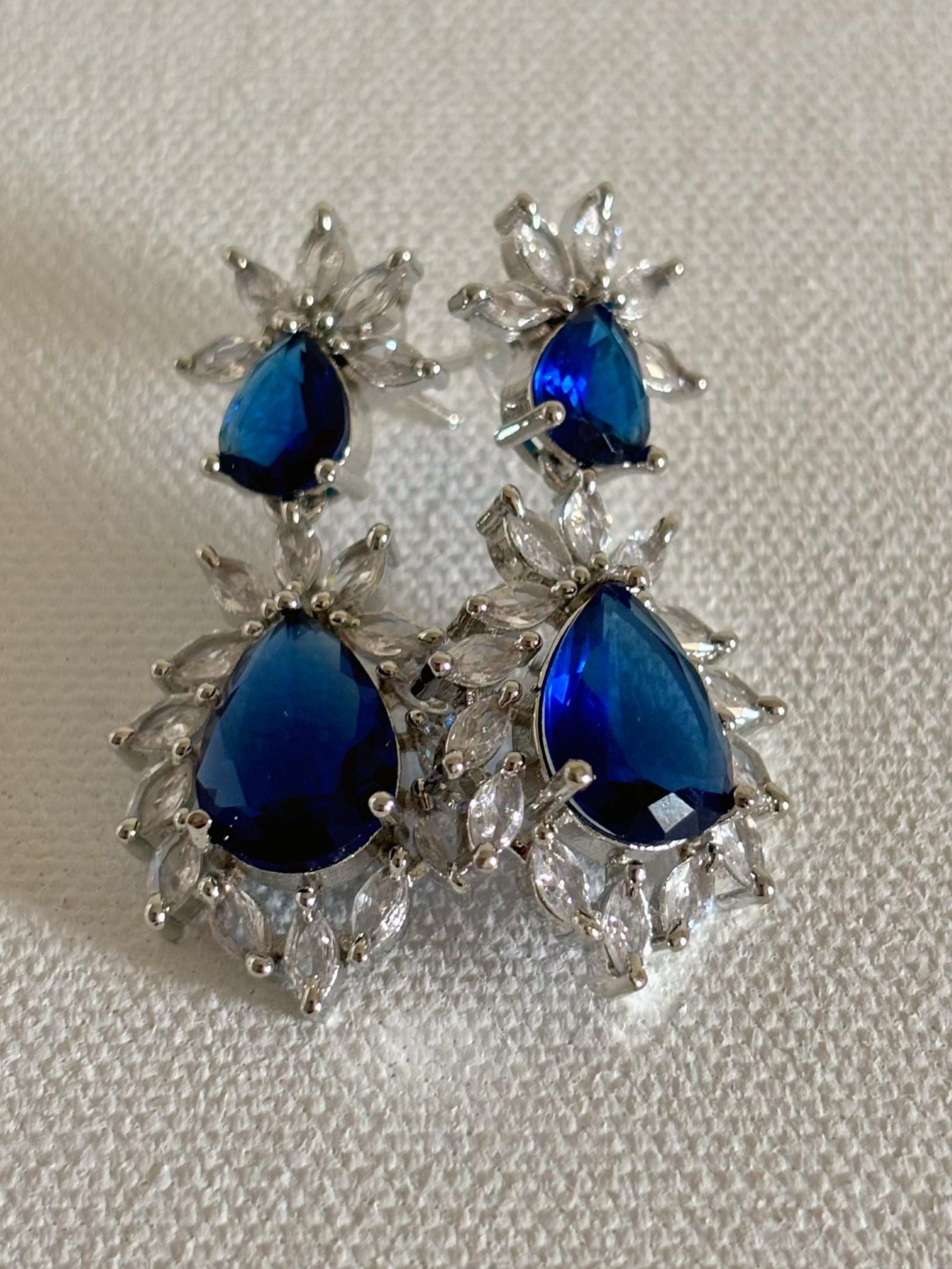 Shop Stylish Double Drop White Stone AD Earrings online. Shop AD earrings, bridal AD jewelry, kundan and AD party necklace sets for sarees, gowns and lehengas. - front