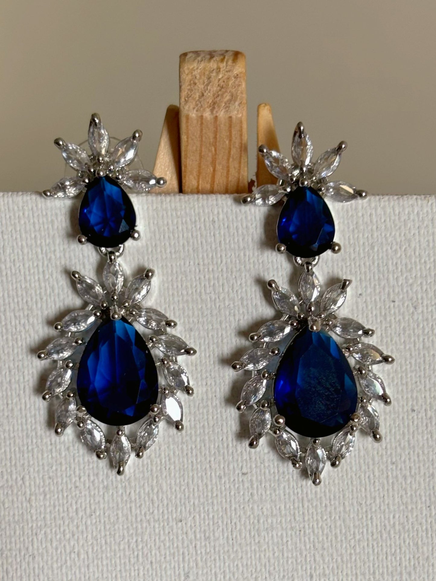 Shop Stylish Double Drop White Stone AD Earrings online. Shop AD earrings, bridal AD jewelry, kundan and AD party necklace sets for sarees, gowns and lehengas. -front