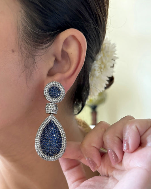Shop Senorita Long Danglers in Blue Nano AD online in India. Shop bridal wedding jewelry, AD earrings, AD earrings sets for cocktail dresses and sangeet night. -front